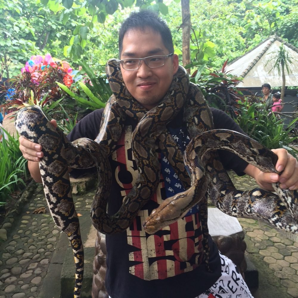 Photo with snake at Alas Kedaton in Bali