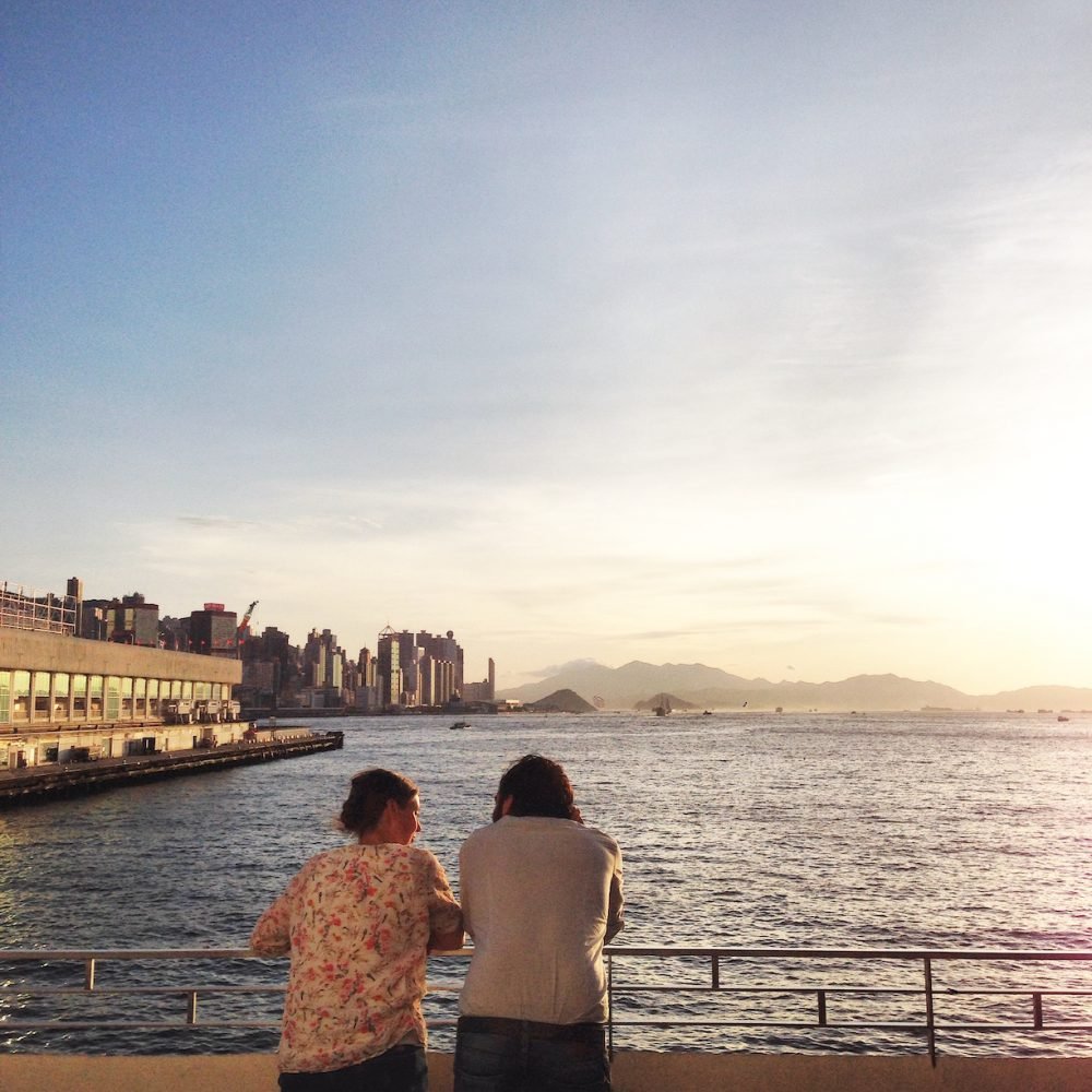 Couple enjoying sunset at Harbour City Hong Kong