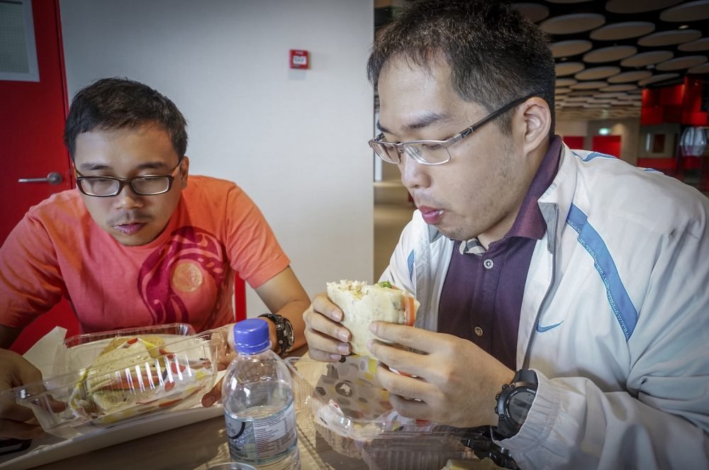 Eating Sandwich at Terminal 2 Cafe in First World Plaza