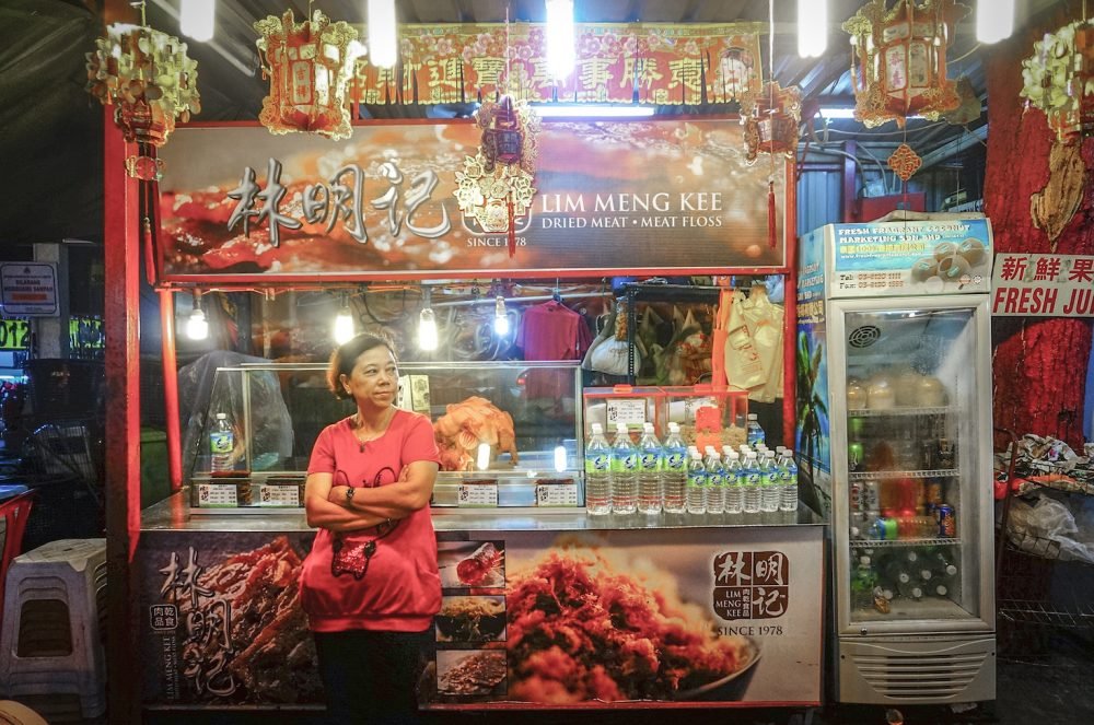 Auntie selling durian Jalan Alor