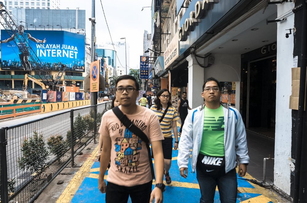 Walking down the street of Kuala Lumpur Malaysia