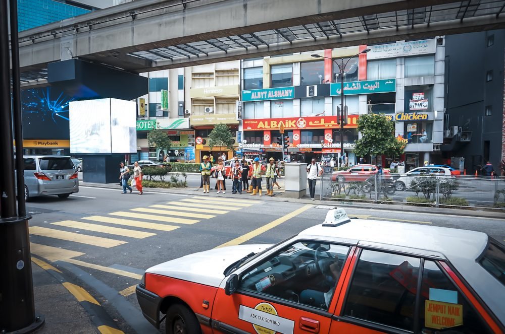 Crossing the street of Bukit Bintang Kuala Lumpur Malaysia