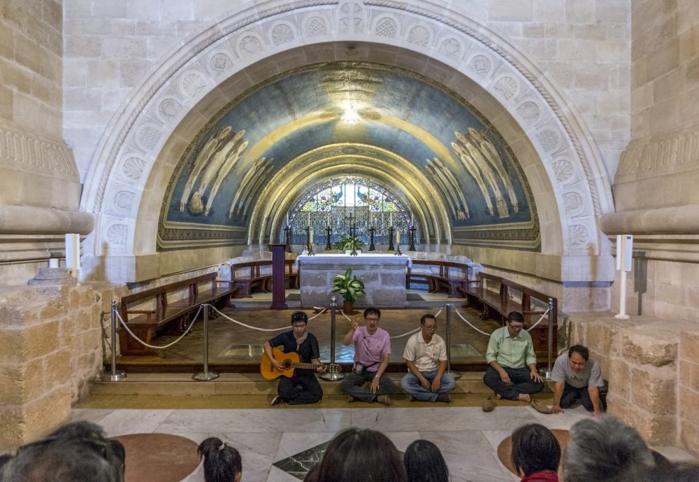 Praying inside The Church of Transfiguration Mount Tabor