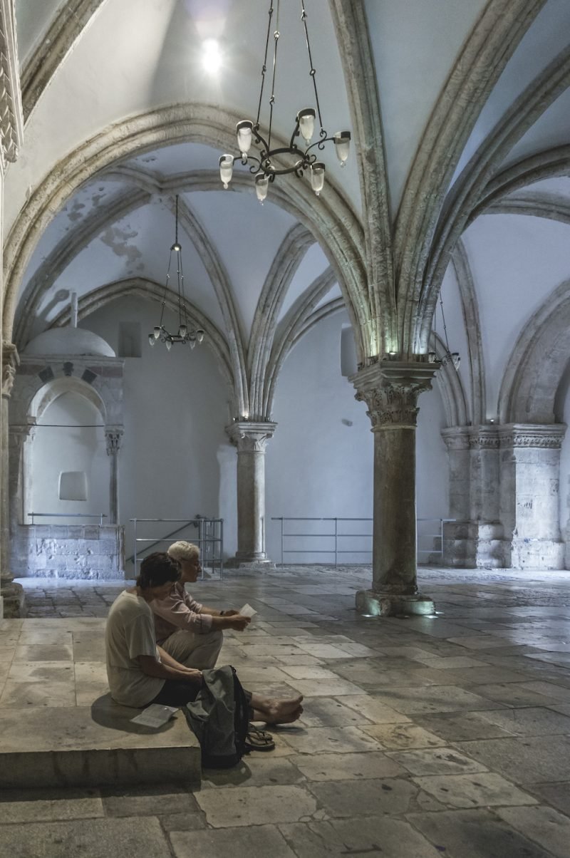 Old Couple reading bible in Upper Room Jerusalem